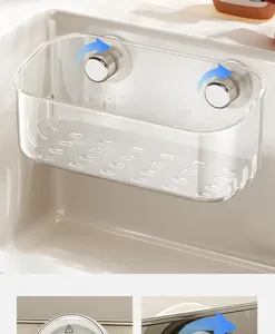Detail van transparante gootsteenbak met zuignappen en afvoergaten voor keukenorganisatie