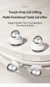 Macro shot of silver ball toilet lid lifters with adhesive base for hygienic lifting