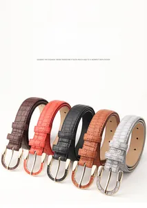 Detail of crocodile pattern PU belts with gold buckles in five classic colors