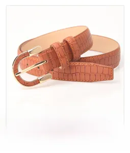 Detail of brown crocodile pattern PU leather belt with gold alloy U-shape pin buckle