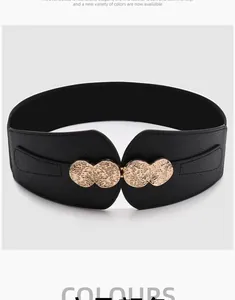 Detail of black lychee grain leather waist belt with gold textured coin buckle for coats