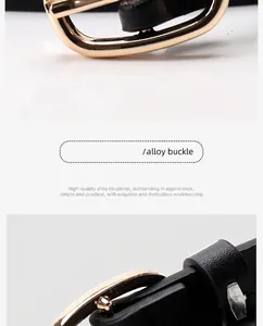 Vue macro détaillée de la boucle ardillon dorée sur une ceinture en cuir noir classique
