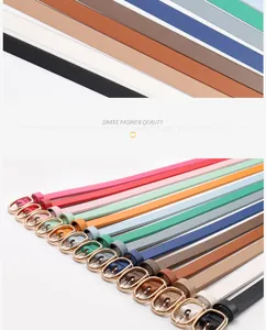 Detailed close-up of slim multi-color PU leather belts with gold oval pin buckles