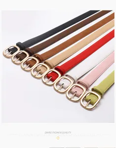 Collection of minimalist women's slim belts with oval matte gold buckles in eight colors