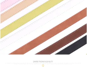 Close-up of slim multi-color leather belts with neat stitching detail for women