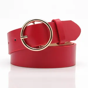 Red casual women belt with polished round gold buckle and minimalist faux leather strap