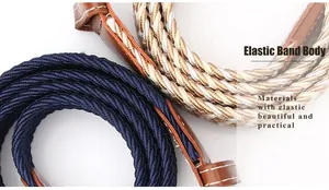 Close-up of elastic woven belt detail with blue fabric and brown leather reinforcement