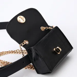 Women black crocodile pattern belt bag with gold chain and metal twist lock