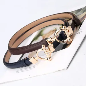 Slim adjustable faux leather belts for dresses in navy and brown with gold buckles