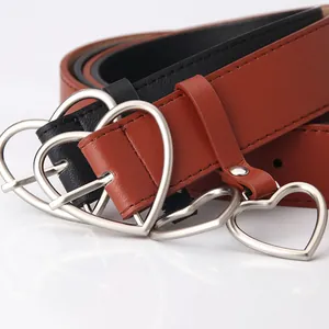 Fashion Women PU Leather Belt With Silver Metal Heart Buckle And Heart Pendant Versatile Simple Decorative Waist Belt For Jeans Dresses
