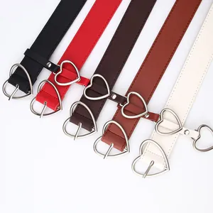 Five assorted colors of faux leather belts with heart buckles and matching heart charms