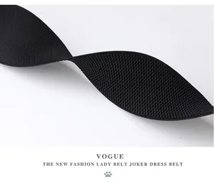 Macro shot showing the dense woven texture of this black elastic fashion waist belt