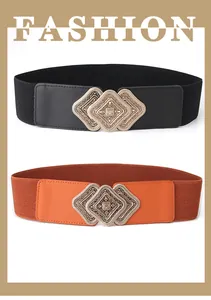 Detail of vintage carved metal buckles on black and brown elastic waist belts