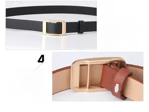 Detail view of black and brown leather belts with gold rectangular pin buckles