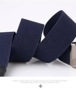 Detailed close-up of navy blue elastic woven belt texture with silver metal buckle