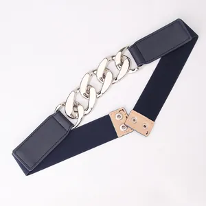 Navy blue elastic waist belt with bold silver metal chain and snap closure