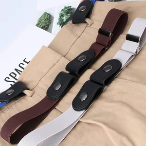 Invisible elastic belt for women shown in brown and cream on khaki trousers with flat buckle
