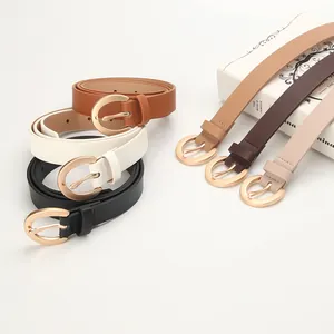 Collection of minimalist faux leather belts for women with gold oval metal buckles