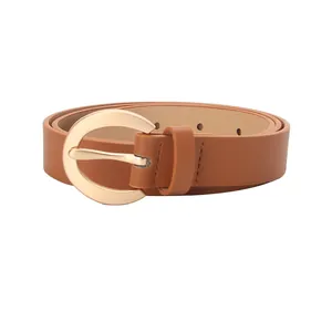 Fashionable brown leather belt for women featuring a gold round buckle on white background