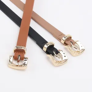 Three-piece set of slim fashion waist belts in black, brown and beige with gold buckles