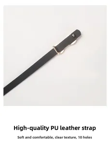 Detail of premium black PU leather strap with gold buckle and 10 adjustment holes
