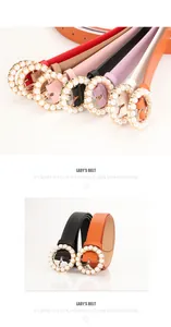 Detail of round golden buckle with inlaid white pearls on colorful faux leather lady's belts