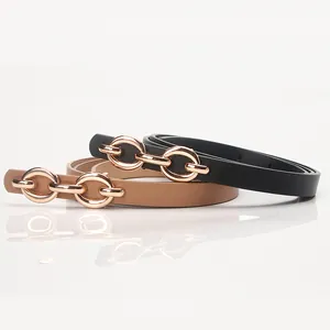 Minimalist women's thin leather belts in black and brown with polished gold ring buckles