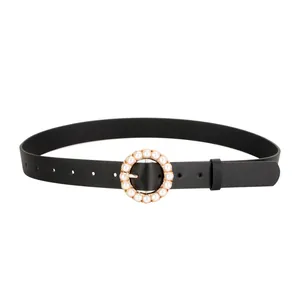 Elegant black leather belt for women with a round pearl buckle on a white background
