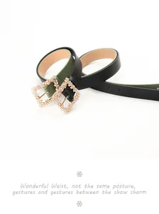 Detail of thin PU leather belts with luxury rhinestone square buckles in black and green
