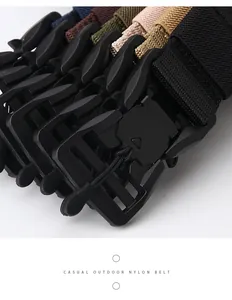 Close-up of tactical nylon belts in multiple colors with quick-release plastic buckles