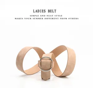 Detailed view of women's khaki nubuck PU leather belt with silver circular metal buckle