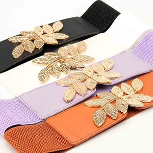 Elastic waist belt for women with elegant golden metal leaf buckle in four vibrant colors