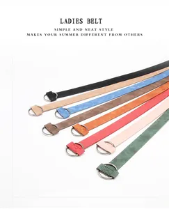 Close-up of vintage PU leather belts in eight colors featuring classic double D-ring buckles