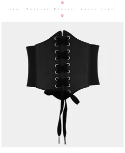 Close-up of black elastic corset belt featuring vintage lace-up front and silver eyelets