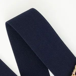 Cinturón elástico azul marino para mujer con tejido denso y hebilla metálica dorada