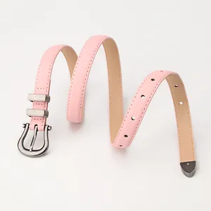 Stylish pink leather belt for women with vintage silver horseshoe buckle on white background