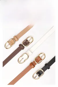 Five assorted colors of slim women's leather belts with golden oval metal buckles
