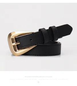 Detailed view of black leather belt for women featuring a polished gold D-ring buckle