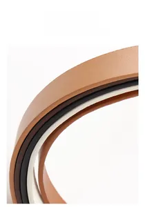 Detail showing multi-layer leather edges with smooth oil finishing and fine texture