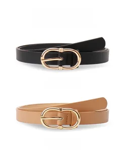 Detail view of stylish women's leather belts in black and khaki with gold metal buckles