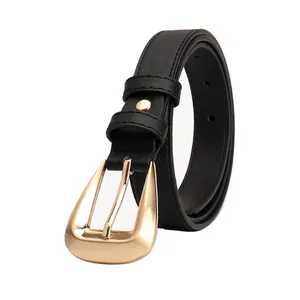 Minimalist black leather belt for women featuring a stylish gold curved metal buckle