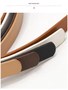 Close-up of slim multi-colored faux leather belts showing detailed grain and textures