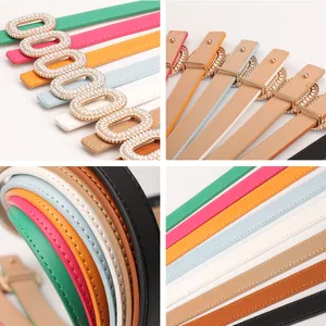Women's faux leather belts with luxury pearl rhinestone buckles in 8 vibrant colors