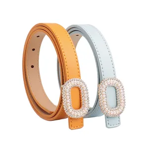 Elegant thin faux leather belts with pearl and rhinestone oval buckles in orange and blue