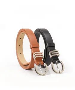 Detailed view of women's leather belts with silver U-shaped buckles in black and brown