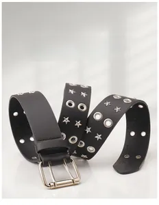 Detail of punk black leather belt with double grommets and silver star rivets decoration