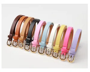 Collection of women's skinny belts in ten vibrant colors with gold horseshoe buckles