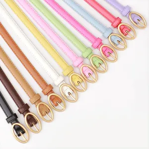 Cinture sottili colorate da donna in ecopelle con fibbie ovali in metallo dorato in 12 toni