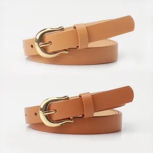 Women's minimalist slim leather belts in brown and caramel with golden U-shaped buckles