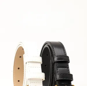 Classic black and white leather belts with vintage gold crescent buckles for jeans